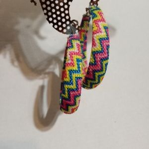 Hoop earrings with woven neon pattern